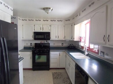 UPDATED GALLERY STYLE KITCHEN.