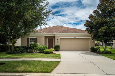 Front of Home with Manicured Shrub Beds.