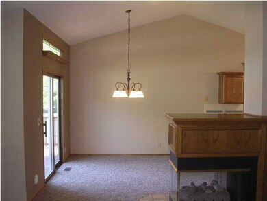 Vaulted Ceiling in Dining Room + Entry to Back Yar