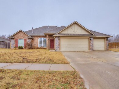 Ranch-style home featuring a garage