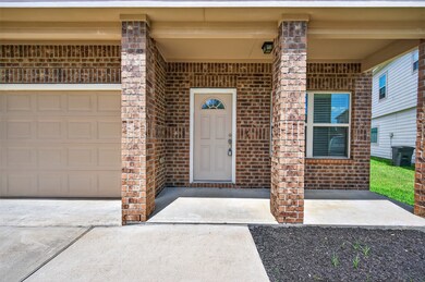 Enjoy shaded comfort on the covered front porch—pe