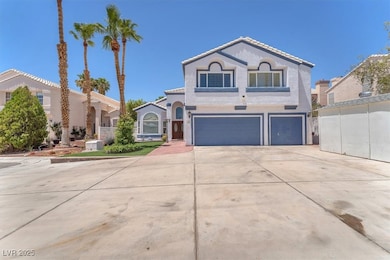 Mediterranean / spanish house featuring a garage,