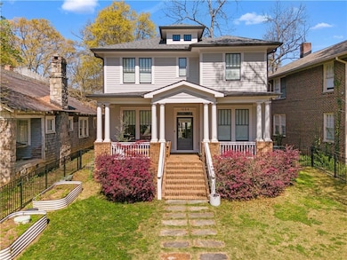 Traditional style home featuring a front lawn, fen