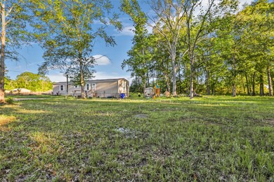 1027 County Road 3141 E, Cleveland, TX 77327 - photo 5