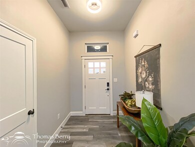 Entryway featuring dark hardwood / wood-style floo