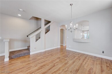 Dining Area, Entry to Kitchen and Stairs to Upstairs Guest Suite