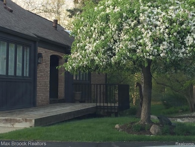 Front entry with blossom tree