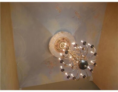 Entry/Foyer. Custom painted trompe l oiel ceiling 