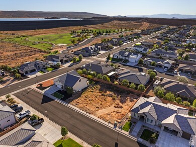 Aerial perspective of suburban area with a mountainous background