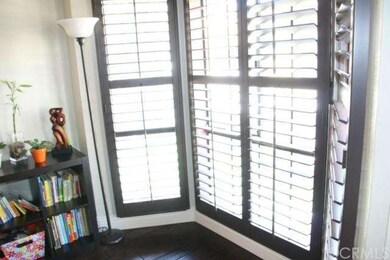 Close up of bay window with shutters.