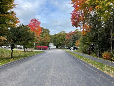 A quiet loop of 24 condos