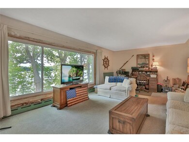 Spacious Living Room with large picture windows ov