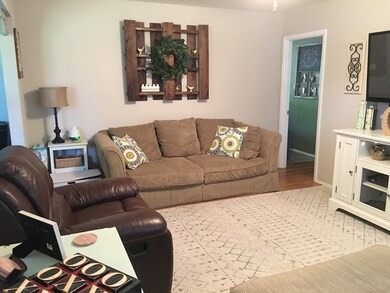 Living Room with Original HW Flooring