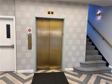 Doorway to property with elevator