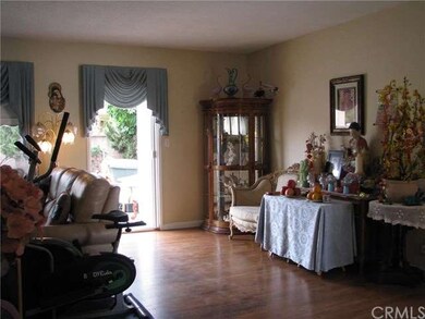 Open floor plan and rooms have wooden floor