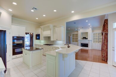 Kitchen has quartz counter tops and the island has