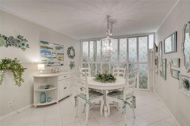 Dining room can be made into an extra bedroom or office possibly (wall would just need to be added). Custom doors were added in front of front window for additional storage