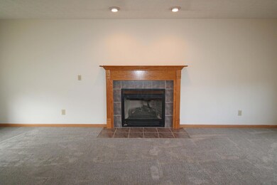 Gas log fireplace with mantel