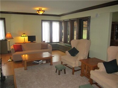 Living Room Natural Woodwork and Replacement Windo