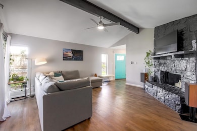 Living area featuring hardwood / wood-style floor