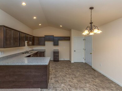 Side view of Kitchen with Breakfast Bar.