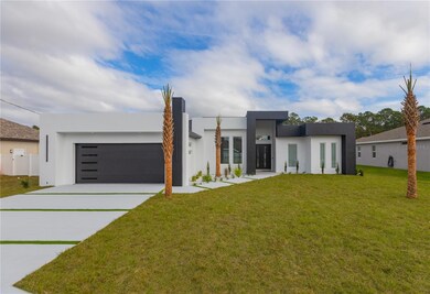 9 Edison Ln, Palm Coast, FL 32164 - photo 2