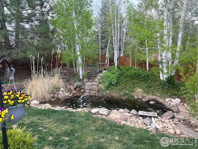 2 waterfalls with aquatic garden and fish northeast corner of back yard