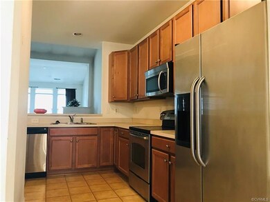 Kitchen has all stainless steel appliances includi