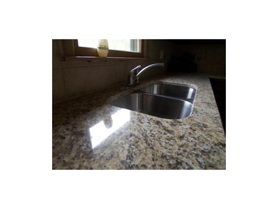 Wonderful granite and undermount sink.