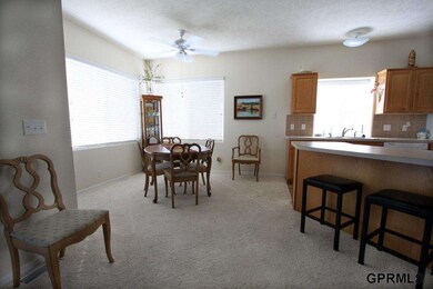 Access to deck with electric awning from dining room.