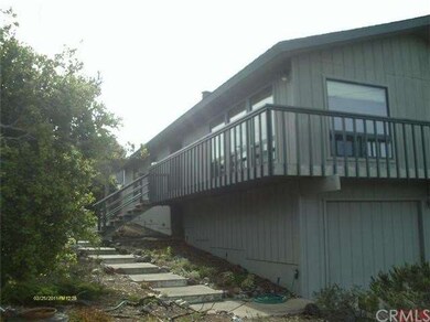 Another view of front of home with entrance on San