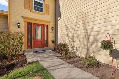 Welcome Home w/ an upgraded red front door!