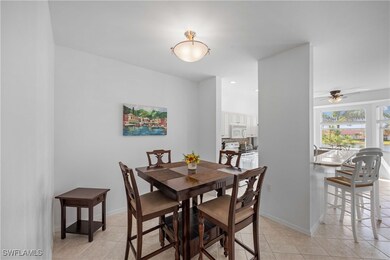 Tiled dining area with ceiling fan