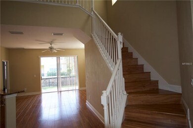 WOOD LAMINATE ON STAIRS, FANS IN ALL ROOMS