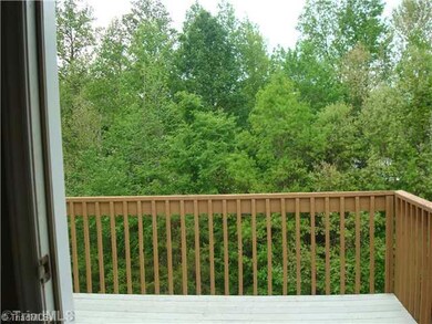 View. View of the deck from the dining room door it s like your in the mountains