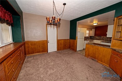 FORMAL DINING ROOM OPEN TO KITCHEN