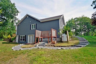 Granite lined path leads to lower...