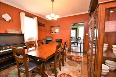 LARGE DINING ROOM WITH HARDWOOD FLOORS