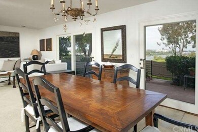 Dining area with access to patio and sweeping view