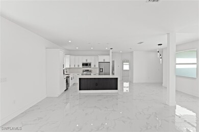 Unfurnished living room featuring light marble fin