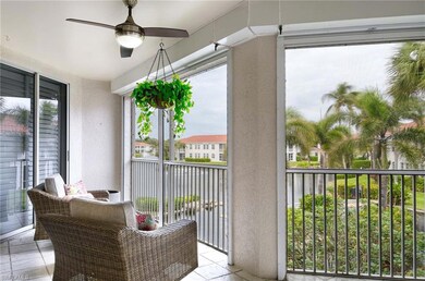 Sunroom featuring ceiling fan and a healthy amount