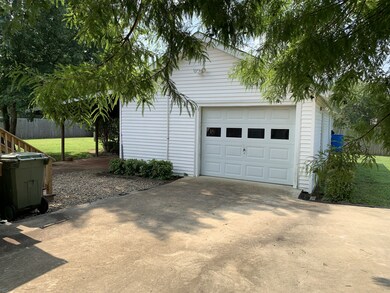 Unattached Large Garage with Screened Entertainment Space