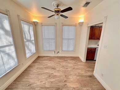 Unfurnished dining area featuring a ceiling fan a