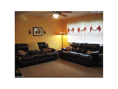 Living Room has a ceiling fan. Window blinds are i