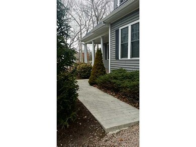 Entry. Pressed concrete entryway leads to composit