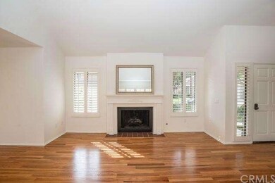 The fireplace features a custom mantle and the who