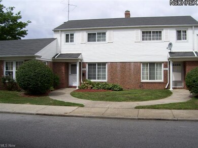Wide view of the front of condo