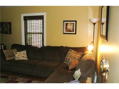 Living Room. Bright living room with many windows.