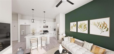 Living room with light hardwood / wood-style floor