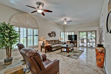 LIVING ROOM WITH PLANTATION SHUTTERS